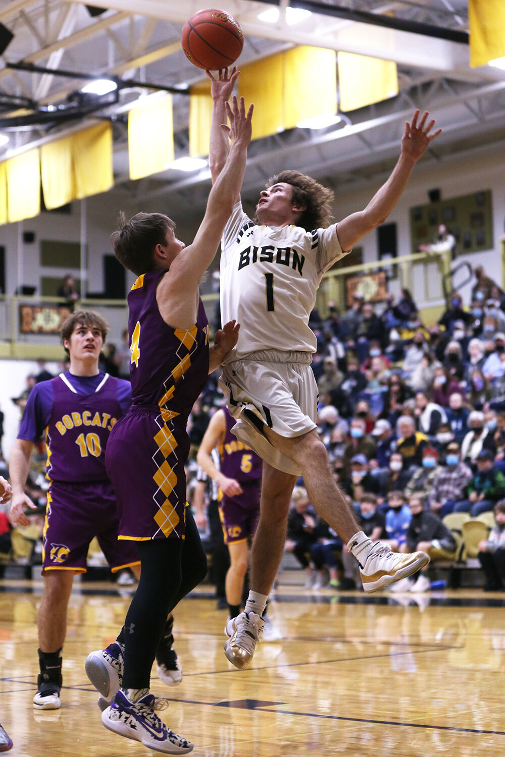 Kollen Milmine jumps and shoots in the first quarter against Thermopolis